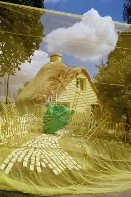 Karlie Kloss and yellow cottage, Rye, 2010 by Tim Walker http://www.vogue.co.uk/news/2012/10/04/tim-walker-story-teller-exhibition-preview/gallery/867871
